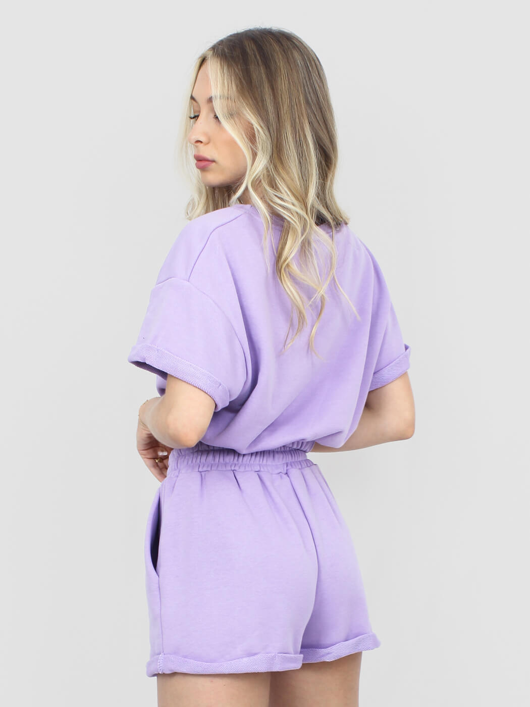 Maglia in tuta lilla con elastico in vita