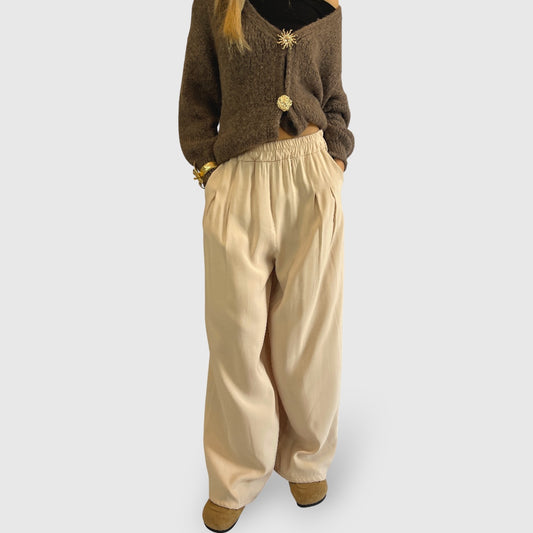 Pantalone palazzo in tessuto fluido con tasche