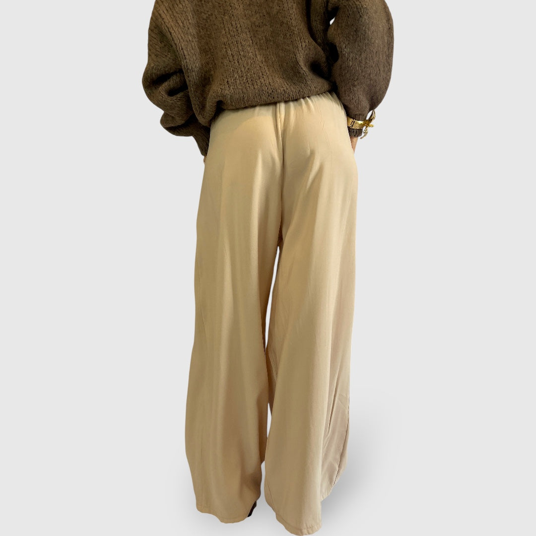 Pantalone palazzo in tessuto fluido con tasche