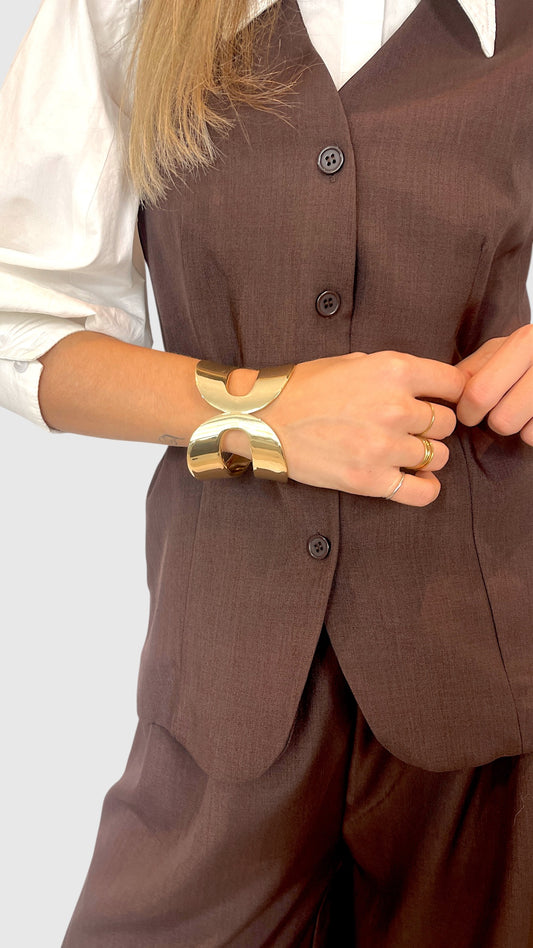 Bracciale rigido scultura in metallo dorato