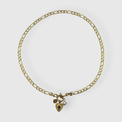 Collana catena in acciaio dorato con ciondoli cuore pietra nera e perla