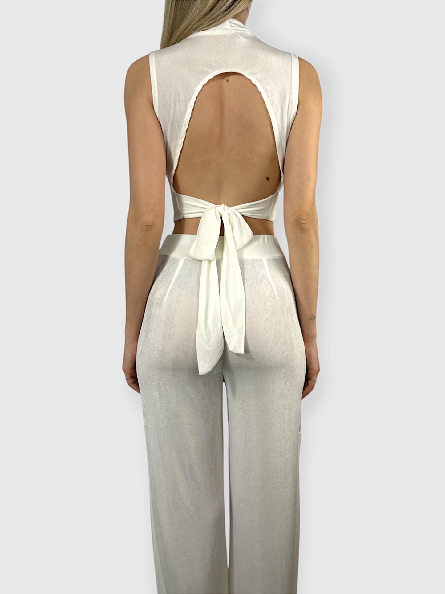 Coordinato top crop e pantalone in maglia leggera