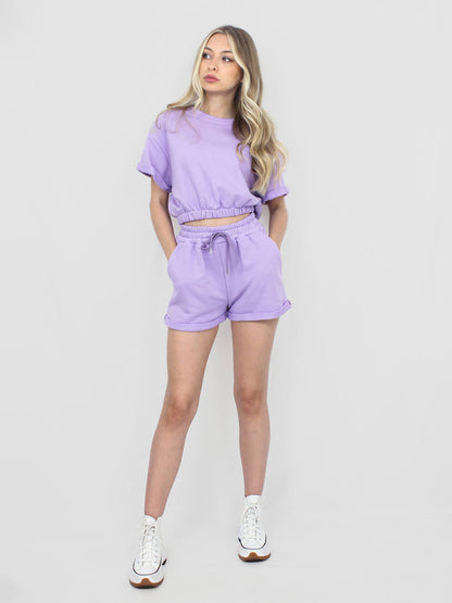 Maglia in tuta lilla con elastico in vita